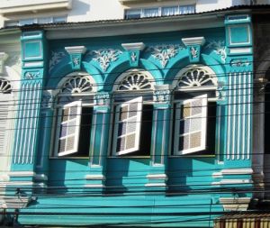 Turquoise colonial architecture - exterior with shutters and ornate detail.jpg